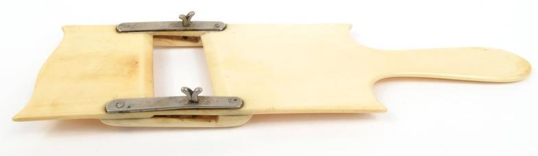 Early 19th century ivory cucumber slice with silver coloured metal mounts 22cm in length : FOR