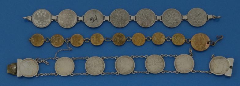 Two silver coloured metal coin bracelets and a gilt metal example approximate weight 60.0g : FOR