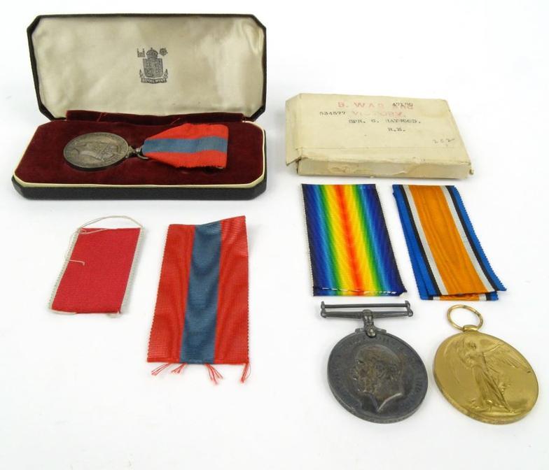 Boxed World War I British military medal group comprising 1914-18 War medal and Victory medal each