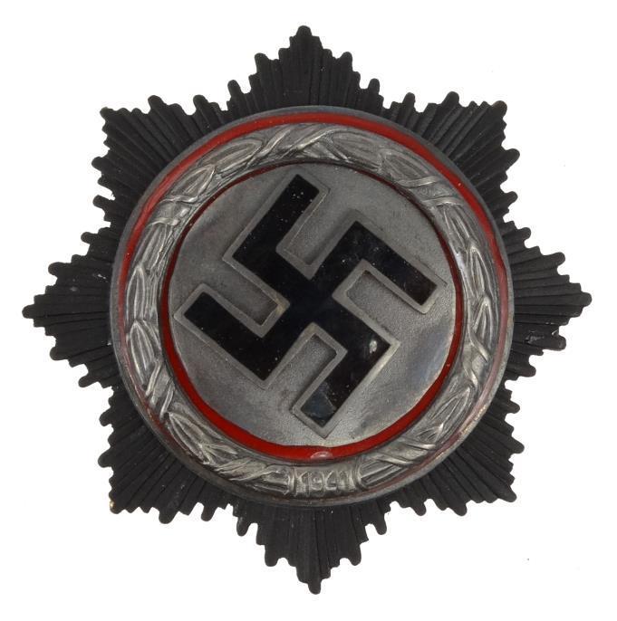 Metal badge - with central enamel Swastika motif, bearing engraved mark `Brehmer Mark iieukirc` to t