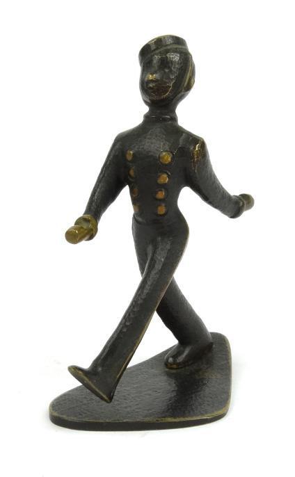 Hagenauer style bronze figure of a bellboy, stamped `Baller Austria` to base, 12cm high : For