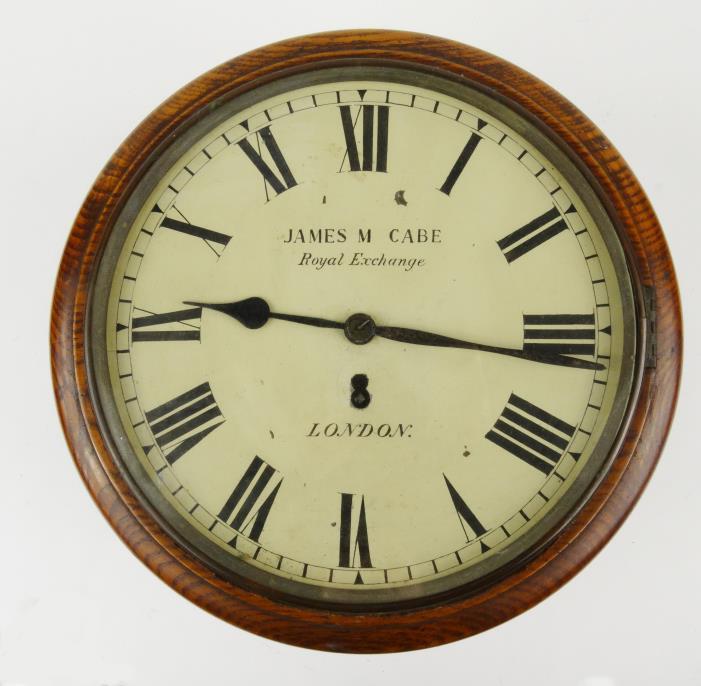 Oak cased wall clock, the dial painted with black Roman numerals and signed James M Cabe, Royal