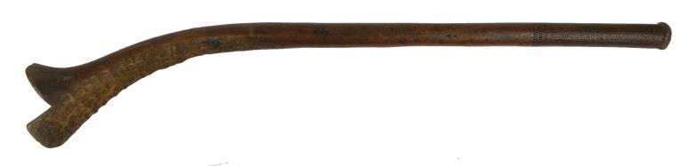 Fijian wooden gunstock throwing stick with geometric carved decoration to the terminal 95cm in