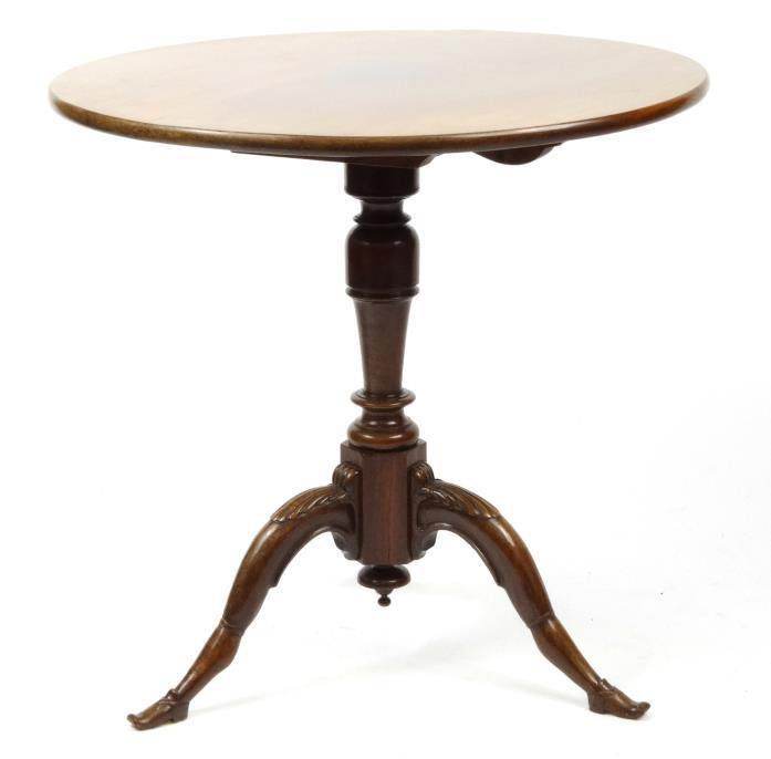 Unusual 19th century mahogany snap top table, the circular top raised on a turned support and three