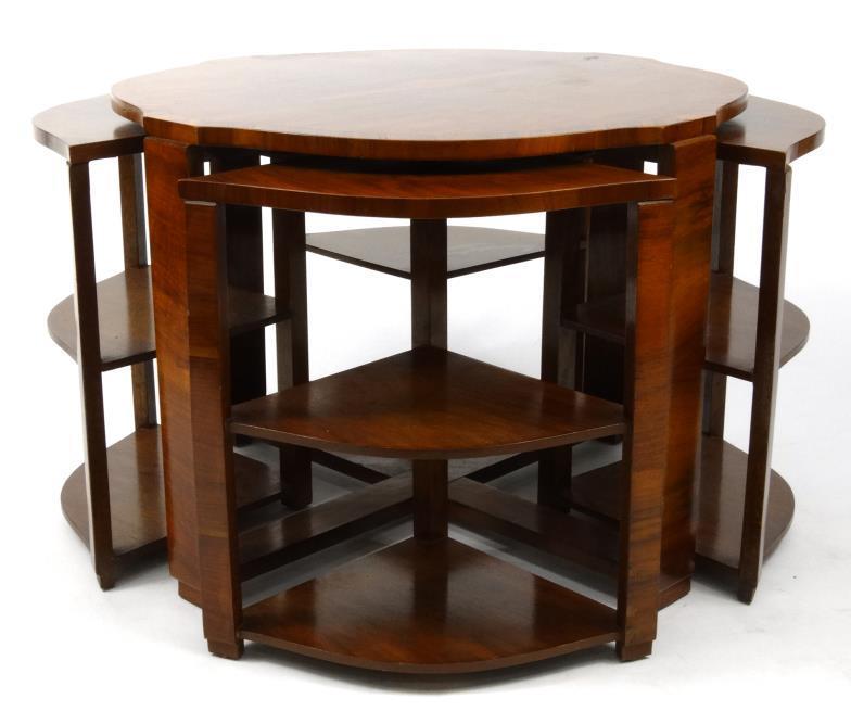 Art Deco walnut nest of tables, the main table with shaped crossbanded top above four nesting