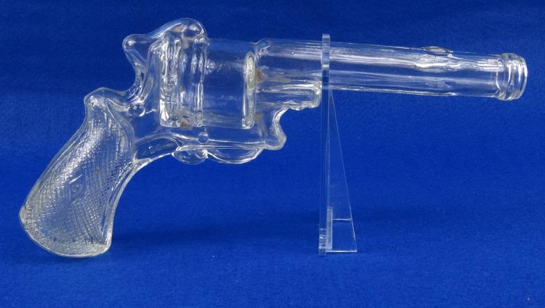 Novelty clear glass revolver shaped flask, possibly American, 25cm in length : For Condition