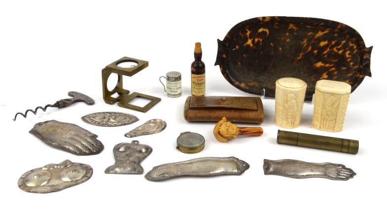 Objects including miniature compass, tin human body part moulds, faux tortoiseshell tray, wooden