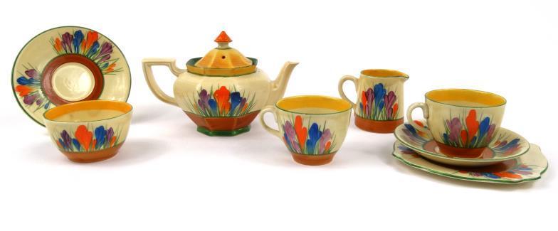 Clarice Cliff tea-for-two service, hand painted with a crocus pattern comprising teapot, cream jug,