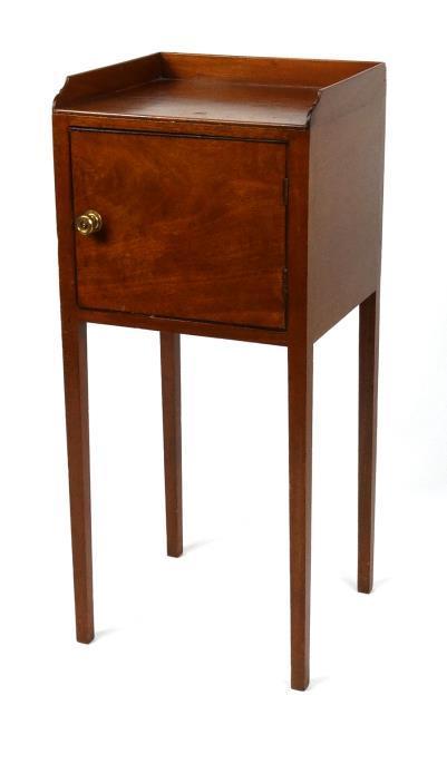 19th Century mahogany pot cupboard, the galleried top above a single cupboard door, raised on