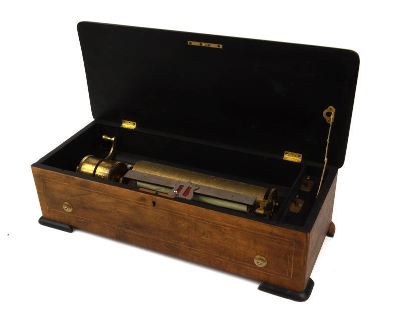 Inlaid rosewood music box with brass cylinder movement stamped `P.V.F.`, 55cm in length : For