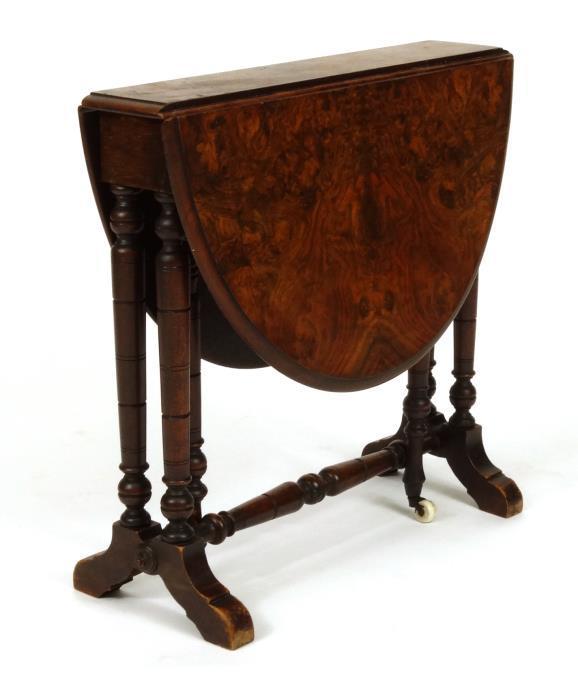 Victorian burr walnut Sutherland table of small proportions, the oval drop leaf top raised on