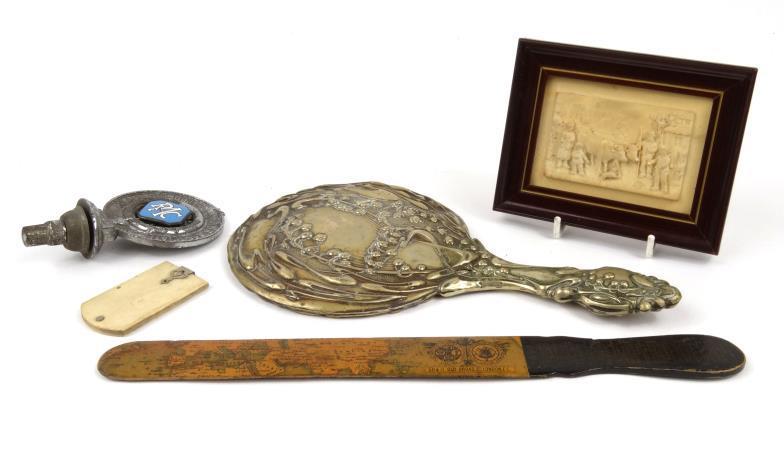 Objects including a ivorine aide memoire, Eastern Telegraph Company advertising page turner, carved