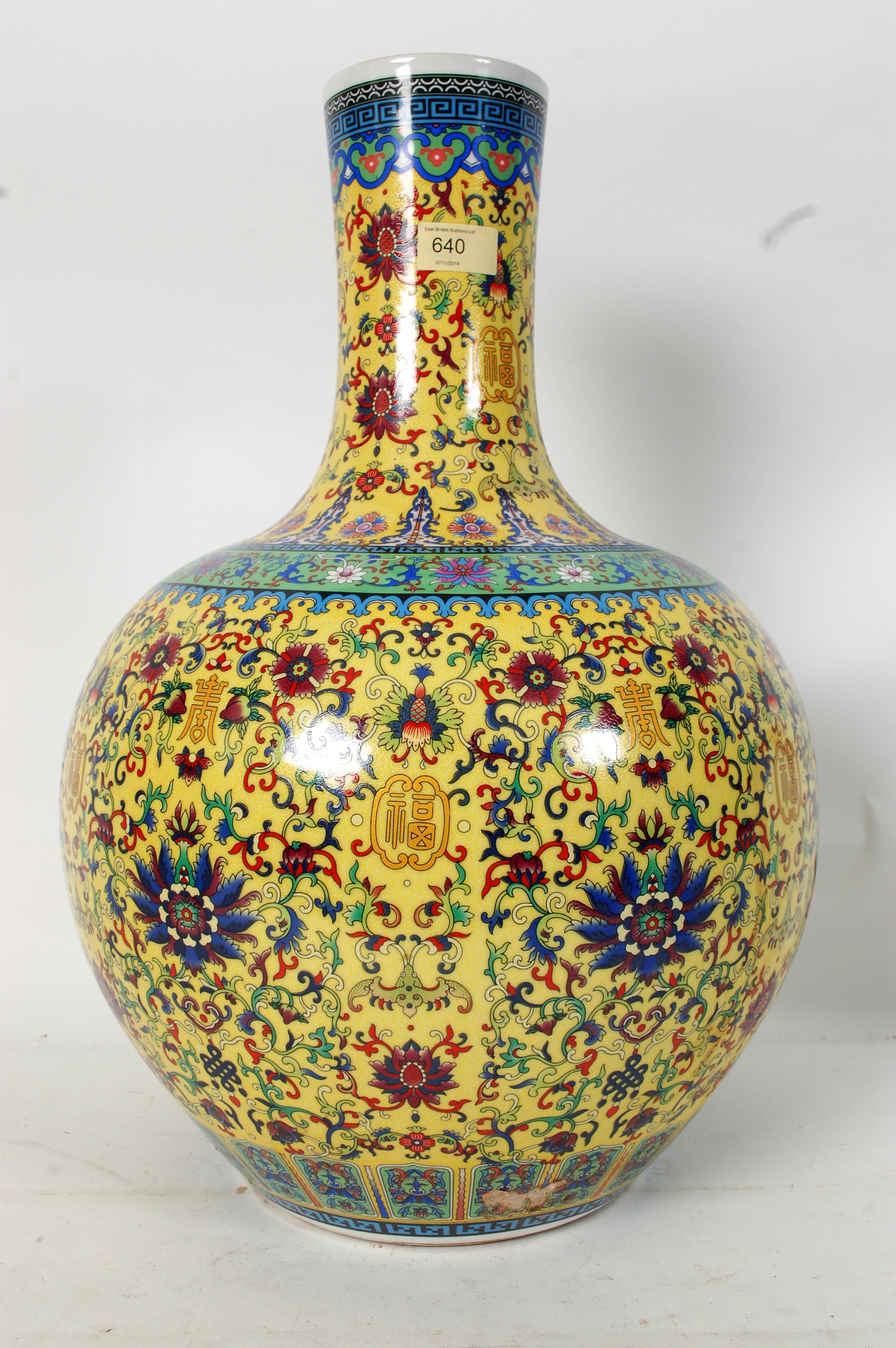 A large chinese vase standing 55cm tall having character marks to base. 55cm
