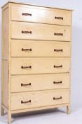 A 1920`s large shabby chic tallboy chest of drawers. Raised on squared supports having a tall