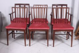 A set of 6 1950`s retro Niels Moller teak wood Danish dining chairs. Raised on tapered legs united