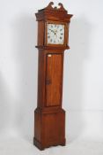 A 19th century oak longcase clock by Alexander Jacobs of Dartmouth. The oak case with central door
