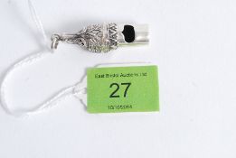A 20th century detailed miniature silver white metal (stamped 925 ) dog whistle, with dog form to