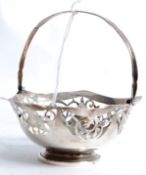 A silver hallmarked bon bon dish of fret pierced design complete with handle hallmarked for London