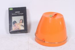 A retro Calor portable hair dryer set along with a boxed Pifco vibratory massager