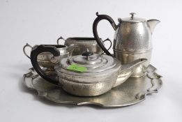 A hand beaten pewter cornish tea set by James Dixon and sons