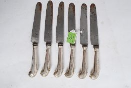 A set of 6 18th century George III silver hallmarked pistol grip knives. The hallmarks being rubbed