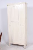 A 1920`s painted shabby chic wardrobe. Full length door with hanging space set within. Measures: