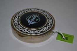 A 20th century white metal and champleve enamel decoratied ladies pill box with hinged top