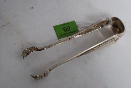 A white metal marked 800 (indicating content of silver ) sugar tongs with claw ends. 41g.