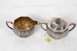 A silver hallmarked creamer together with the matching sugar bowl.  Weight 446 grams