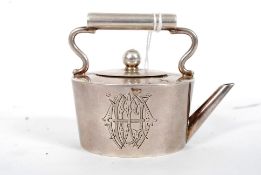 A silver 19th century figurine of a kettle being unmarked bearing notation ' Malta 1898 ' Weight