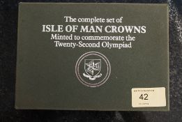 A boxed set of 1980 Isle Of Man silver proof crown coins. Boxed, with certificate.