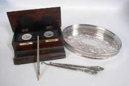 A vintage twin inkwell along with a vintage bottle of Quink, a hallmarked silver dipping pen, silver
