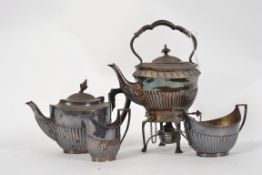 An early 20th century Edwardian silver plate Elkington spirit burner set, comprising of burner,
