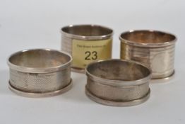 2 pairs of silver hallmarked napkin rings, one with Birmingham HG&S hallmarks, the other pair having