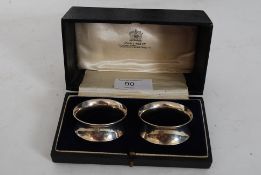A pair of boxed hallmarked silver napkin rings in original box  for John Vincent of Weymouth
