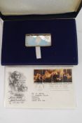 A boxed hallmarked silver ingot for the Queen of England dated July 4th  1776 - July 4th 1976. The