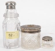 Three hallmarked silver topped glass condiment shakers. (lids only weight 20g)