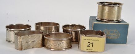 8 hallmarked silver napkin rings having various assay office marks to include boxed example etc