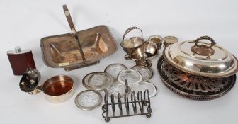 A collection of silver plate to include wine coasters, toast rack, salvers etc  ( please see