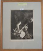 A lithograph print of abstract man and goat scene being framed and glazed by Catherine Maw Johnson.