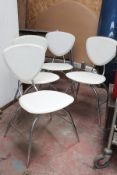 A set of 4 late 20th century Italian white leather and chrome dining chairs bearing compliant fire