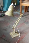 A vintage 1940`s cream and mottled finish Herbert Terry anglepoise industrial desk lamp raised on