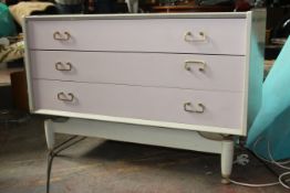 A pair of painted ( original) G-Plan 1960`s chests of drawers being raised on faux suspension set
