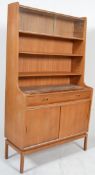 A 1970`s Minty Danish inspired teak sideboard /  bookcase display cabinet. Raised on tapered