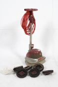 A vintage 1950`s Electrolux floor cleaner having red handles with lead and labels etc
