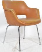 A 1970`s chrom and  mustard Vinyl salon armchair. Raised on chrome supports with the original