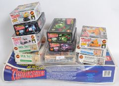A quantity of 12 Imai Thunderbirds model kits. Some unopened.