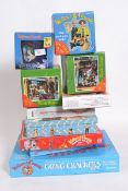 A quantity of Wallace & Gromit games and jigsaws.