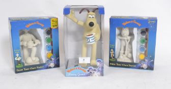 Three Wallace & Gromit Curse Of The Wererabbit figures, two ` paint your own` figures.