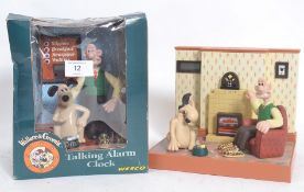 Two Wallace & Gromit Wesco Alarm Clocks, one boxed.